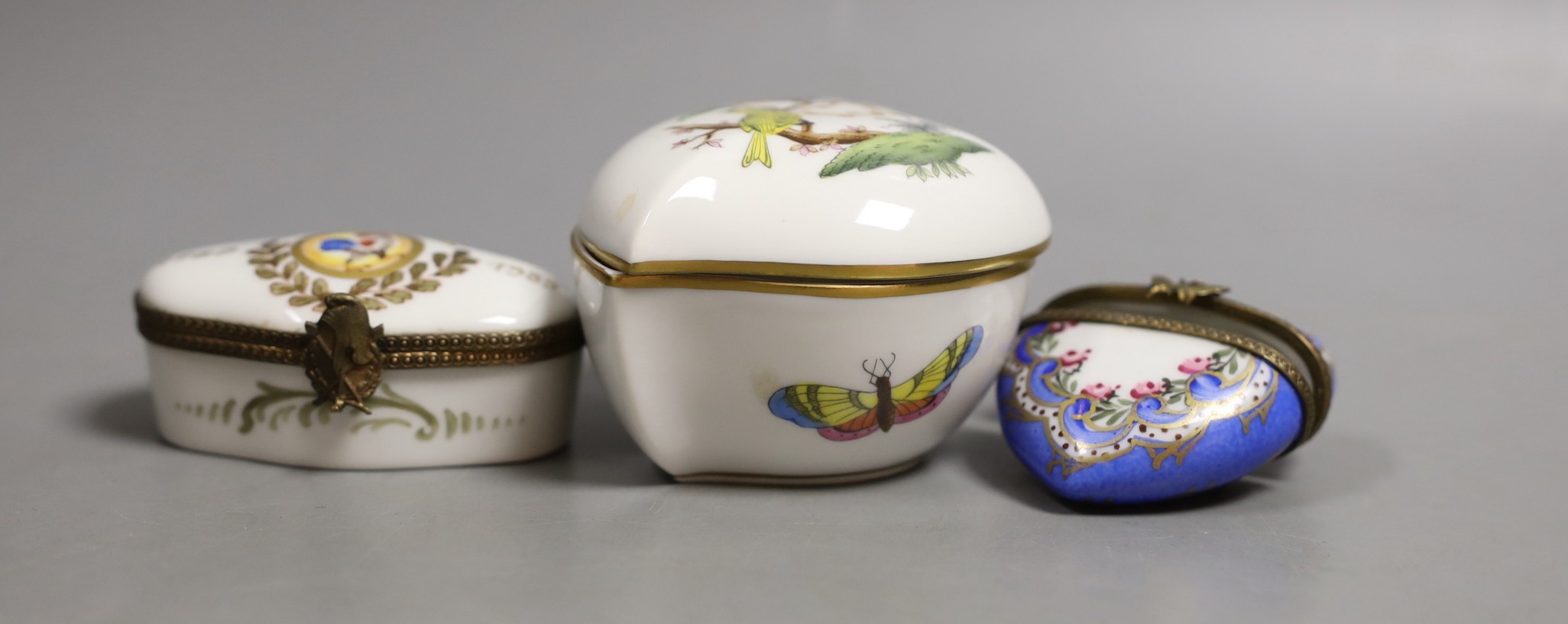 Four Halcyon Days enamel boxes, a Herend Rothschild Bird box and cover, and other trinket boxes (9)